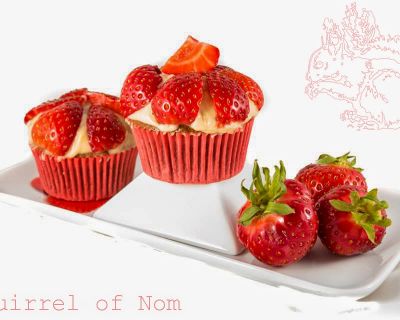 Vanilla Cupcakes with Vanilla Buttercream and Strawberries